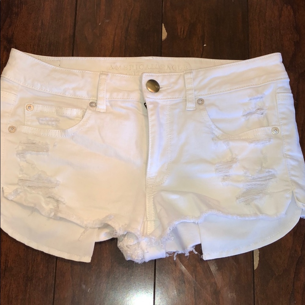 White distressed shorts